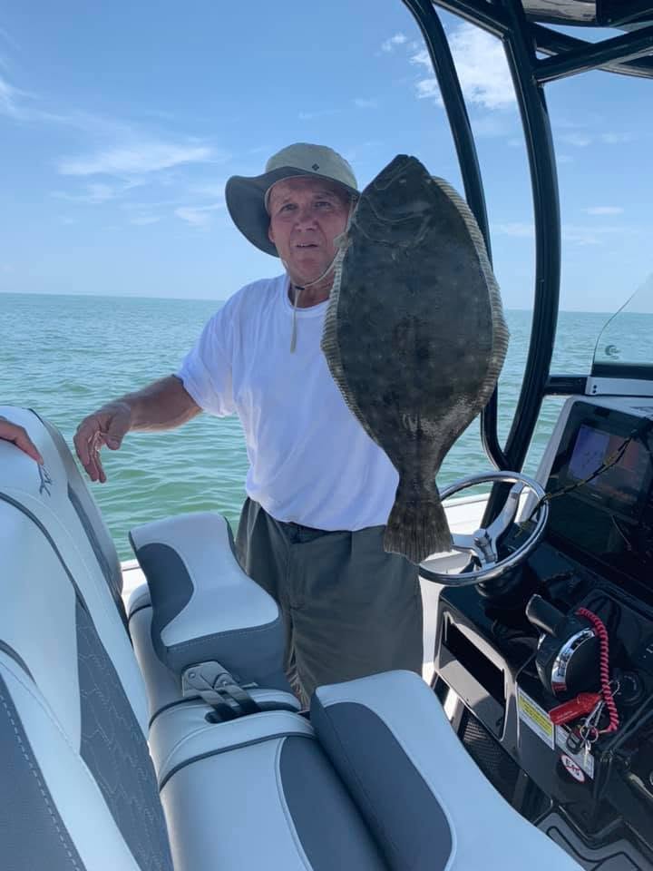 Summer flounder caught fishing in Carolina Beach NC displayed on boat