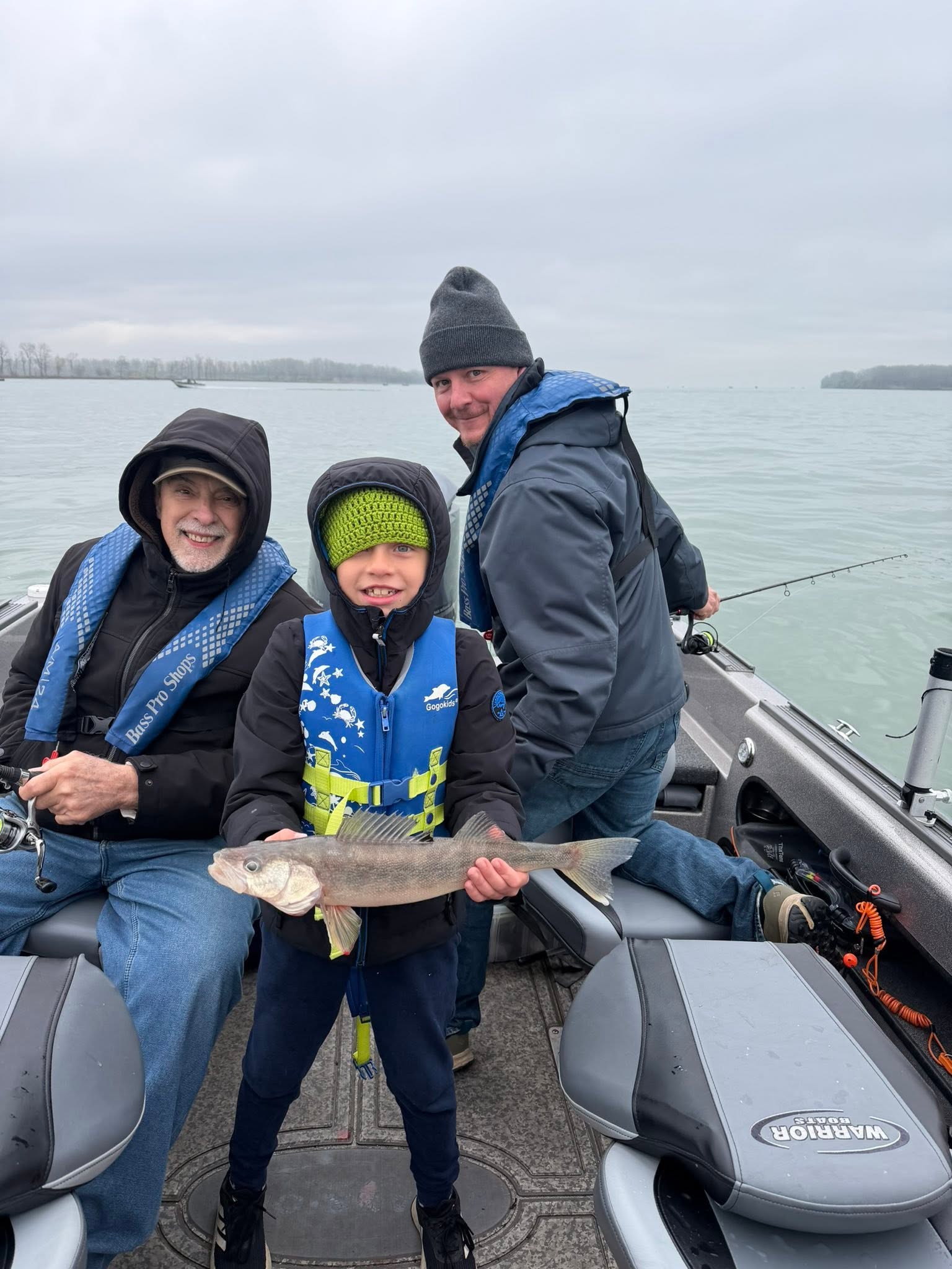 Successful walleye fishing trip on Lake Erie near Huron Ohio with freshly caught fish
