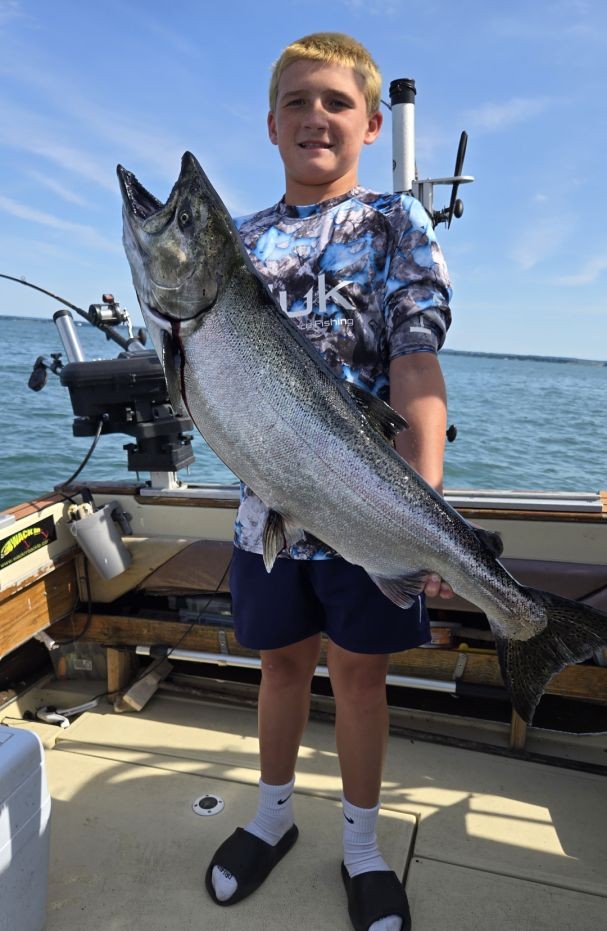 Chinook salmon caught while fishing in St. Catharines ON displayed on boat deck