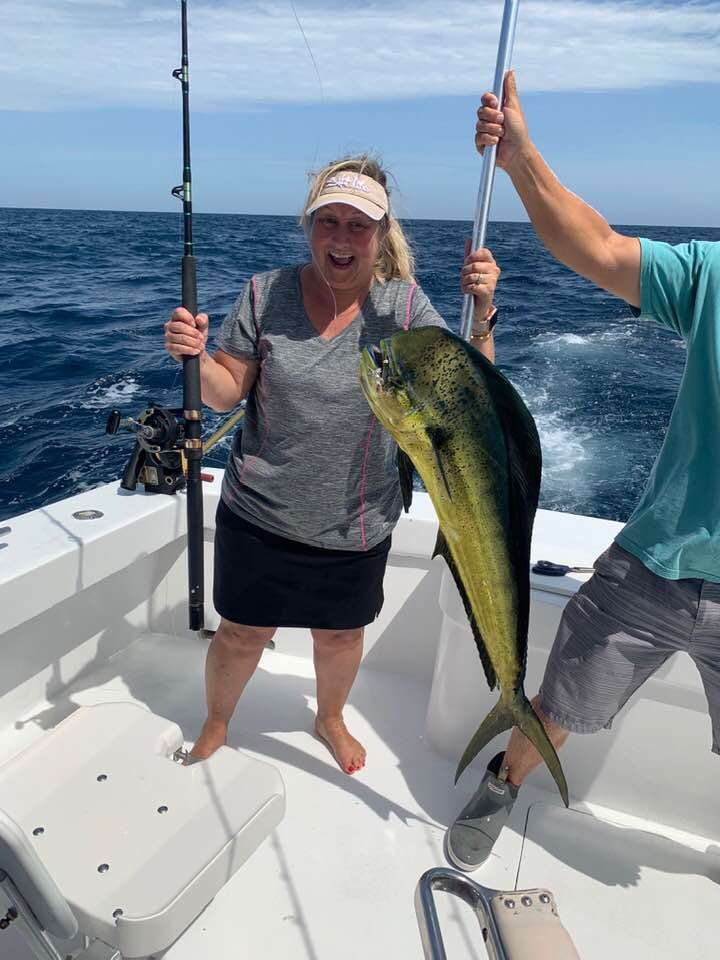Angler catching a 30-inch fish in NC