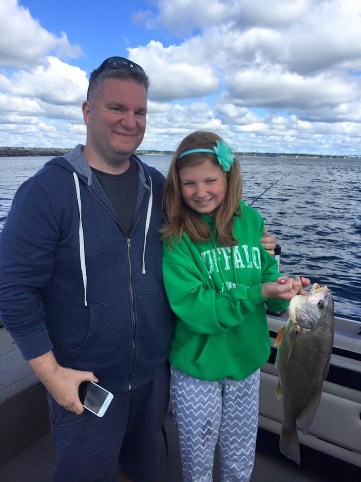 Two people fishing in North Tonawanda