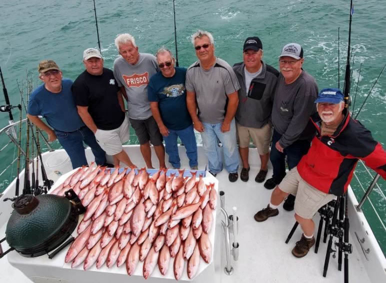 Group of 8 people fishing at Orange Beach