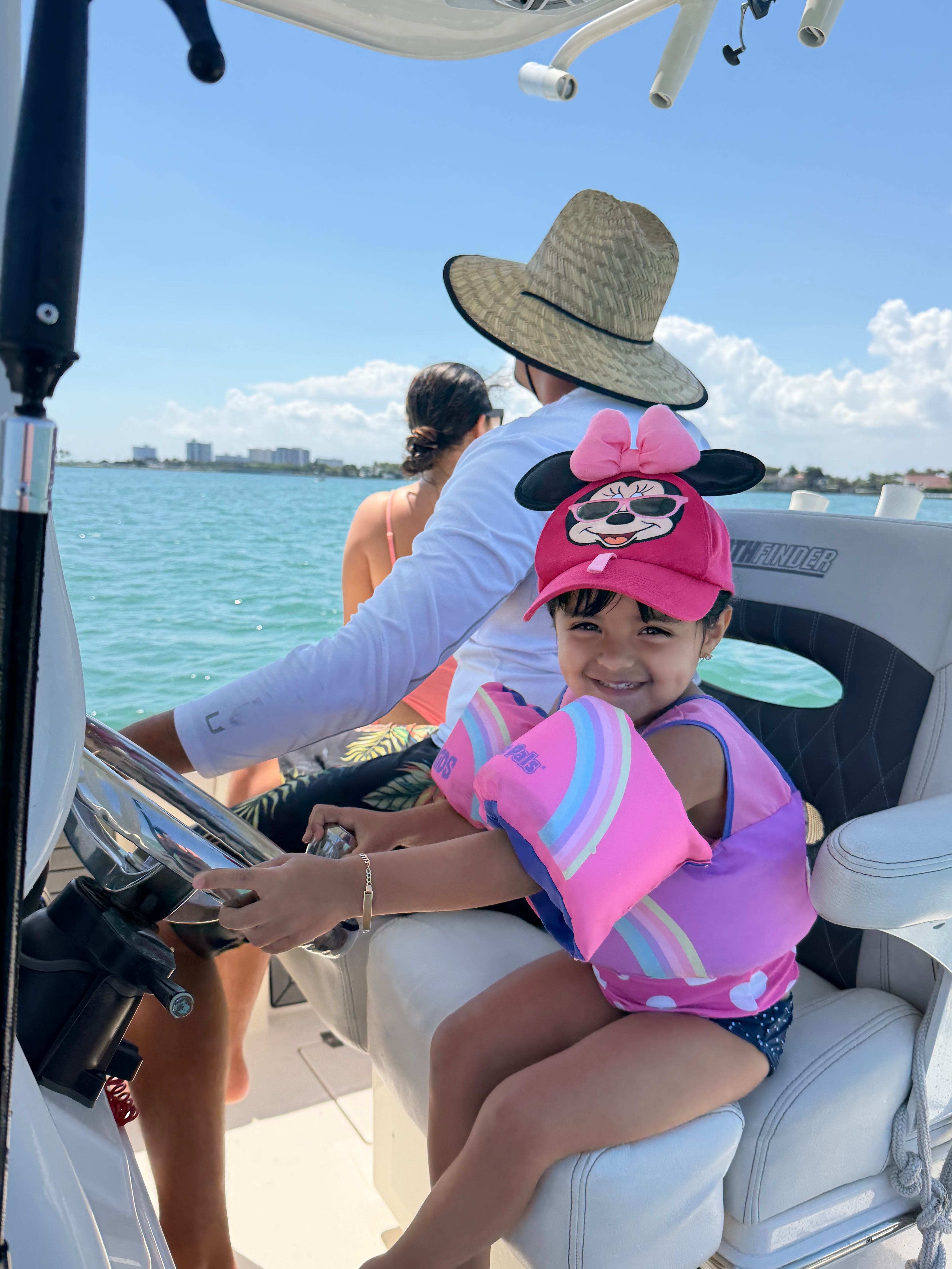 Boat cruise on turquoise waters in North Miami FL with clear blue skies