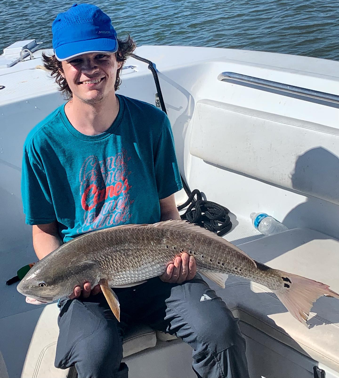 Angler with a big redfish caught at New Smyrna Beach