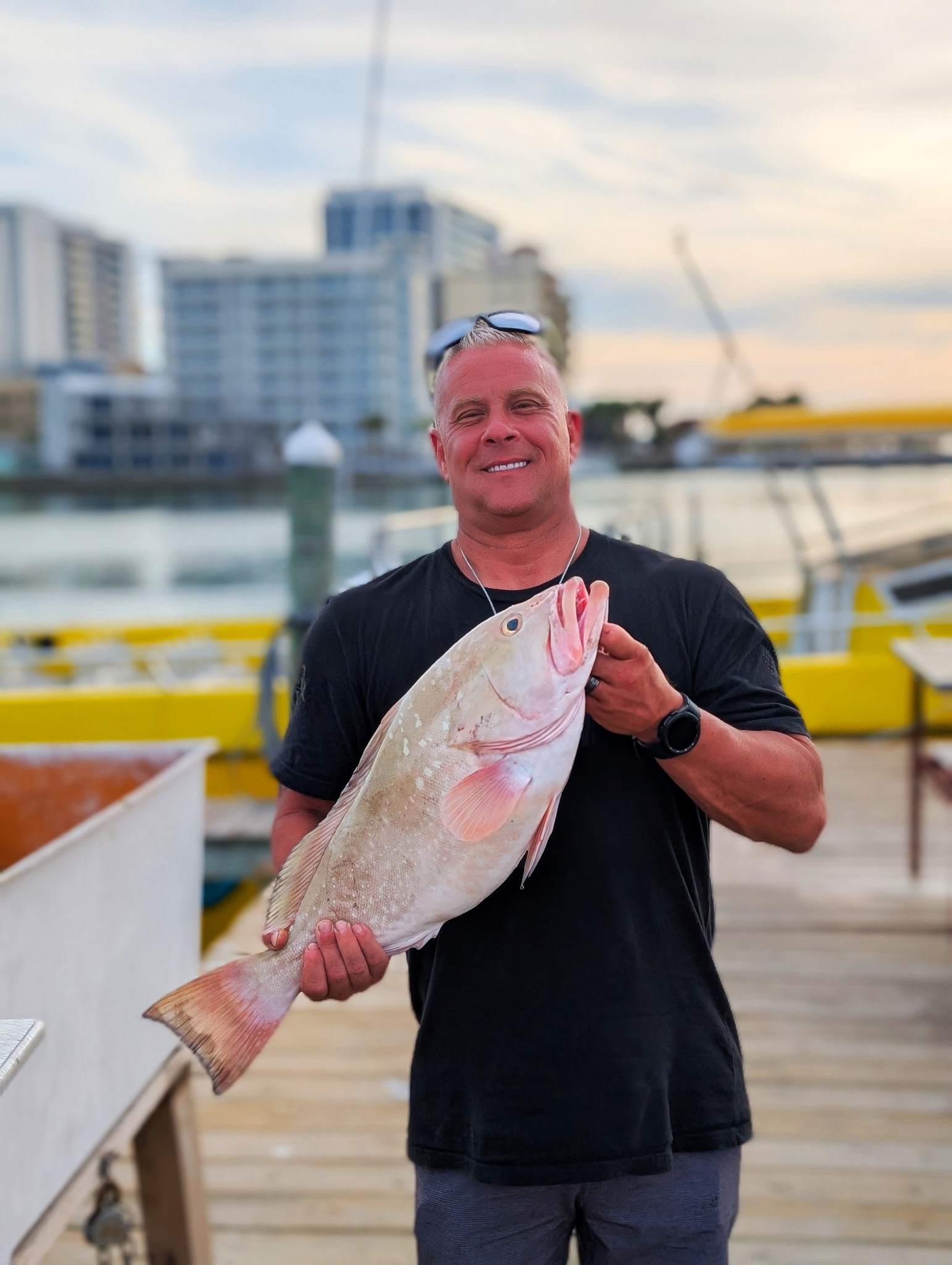 Angler reeling in a catch at Clearwater Beach