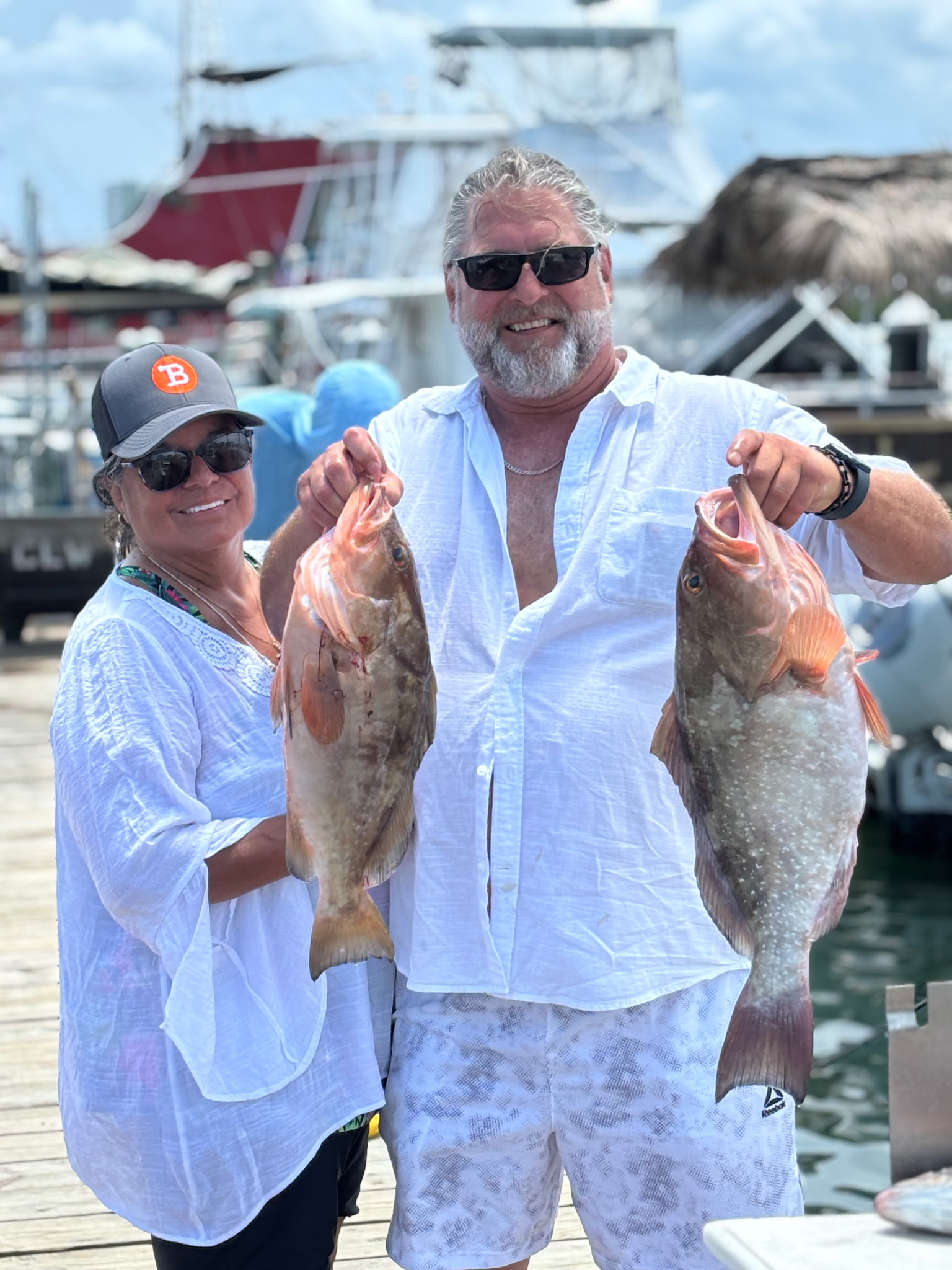 Two anglers fishing in FL with 2 big fish