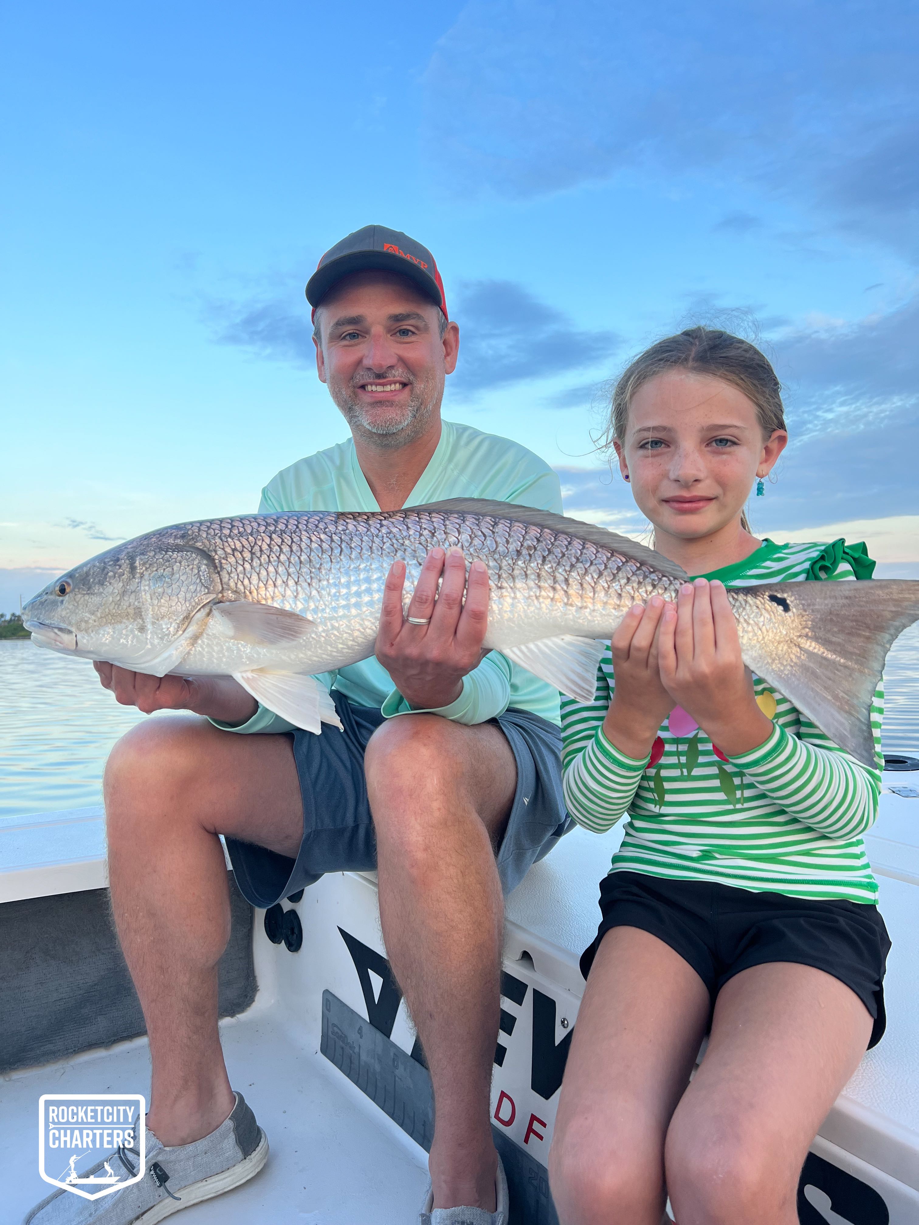 Two people fishing in Cocoa