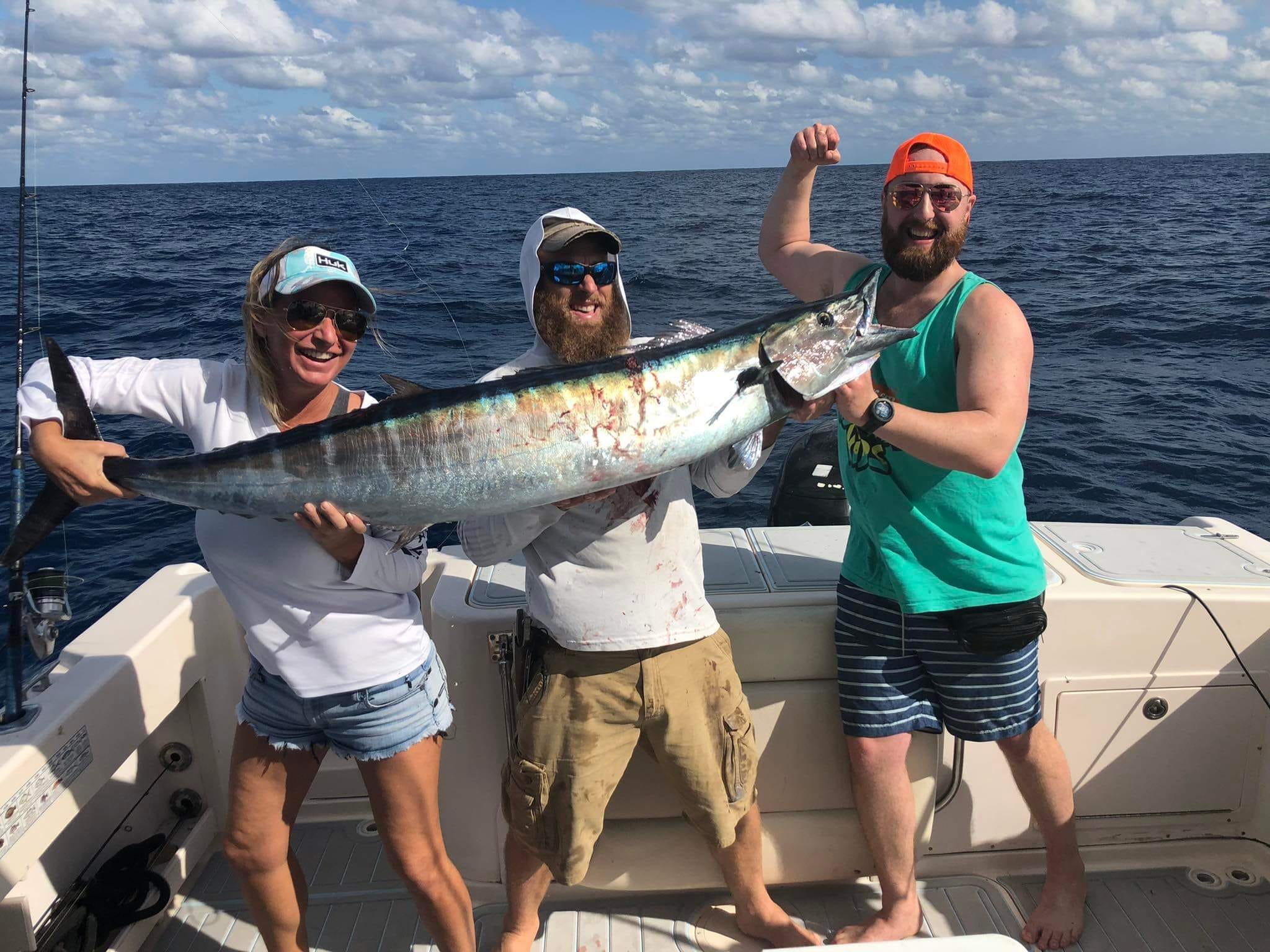 Three anglers fishing in Florida with a single fish catch
