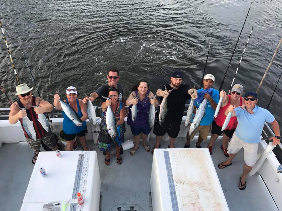 Group of 9 people fishing in FL