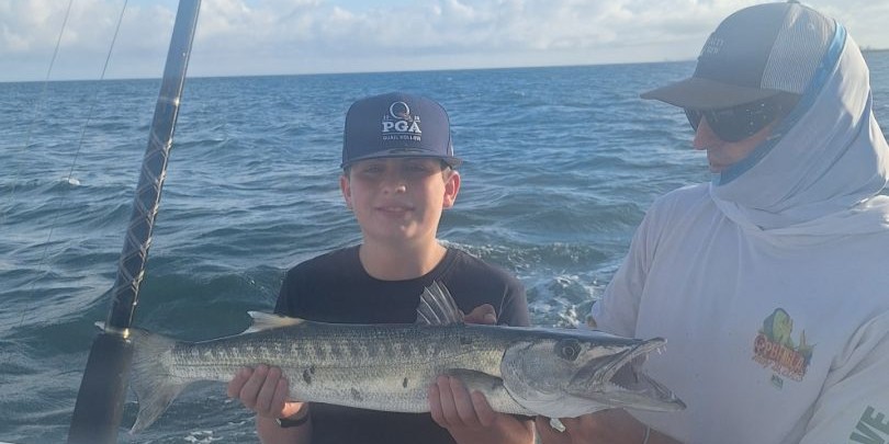 Kids fishing charter boat in Fort Lauderdale with Captain James teaching young anglers