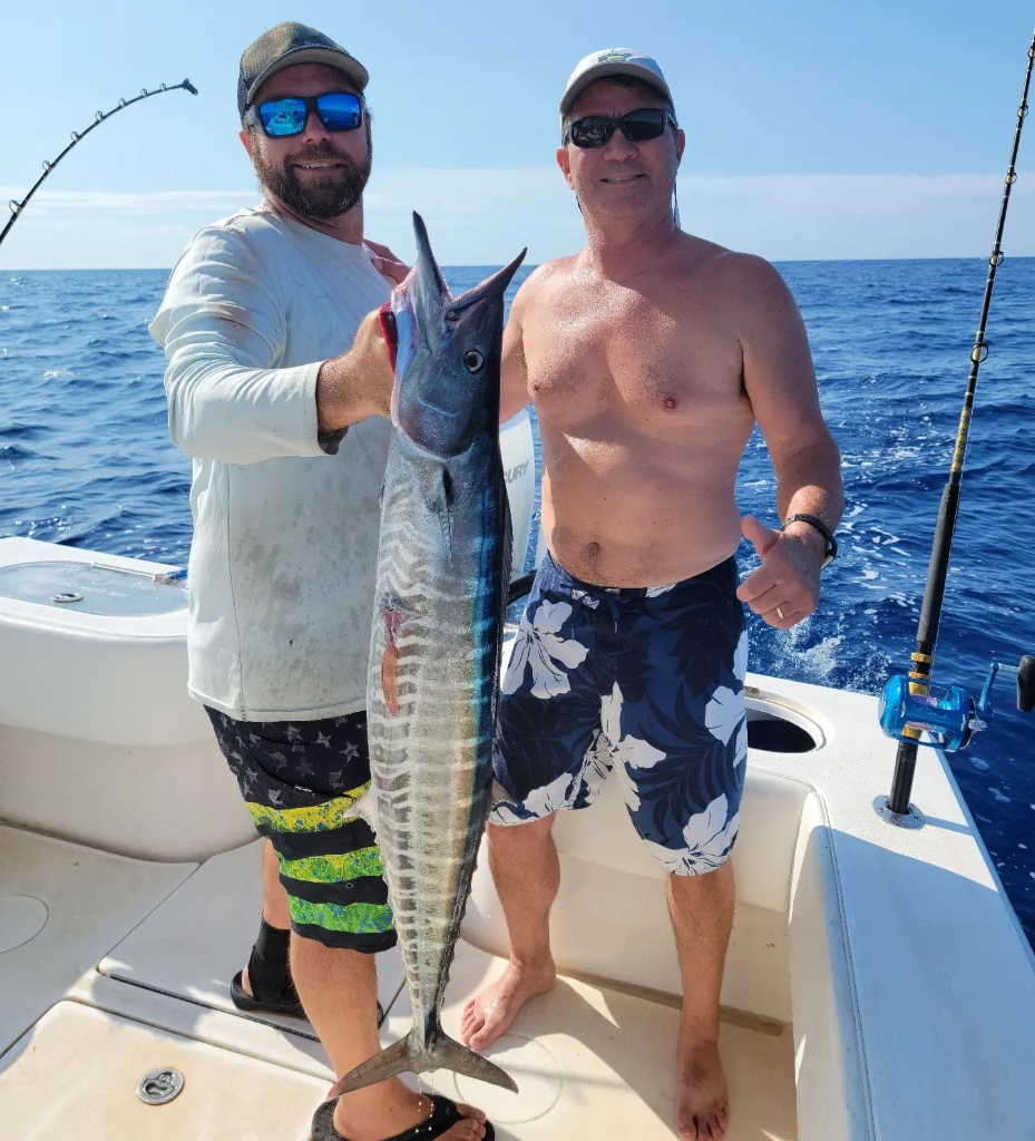 2 anglers holding a big bass in Florida