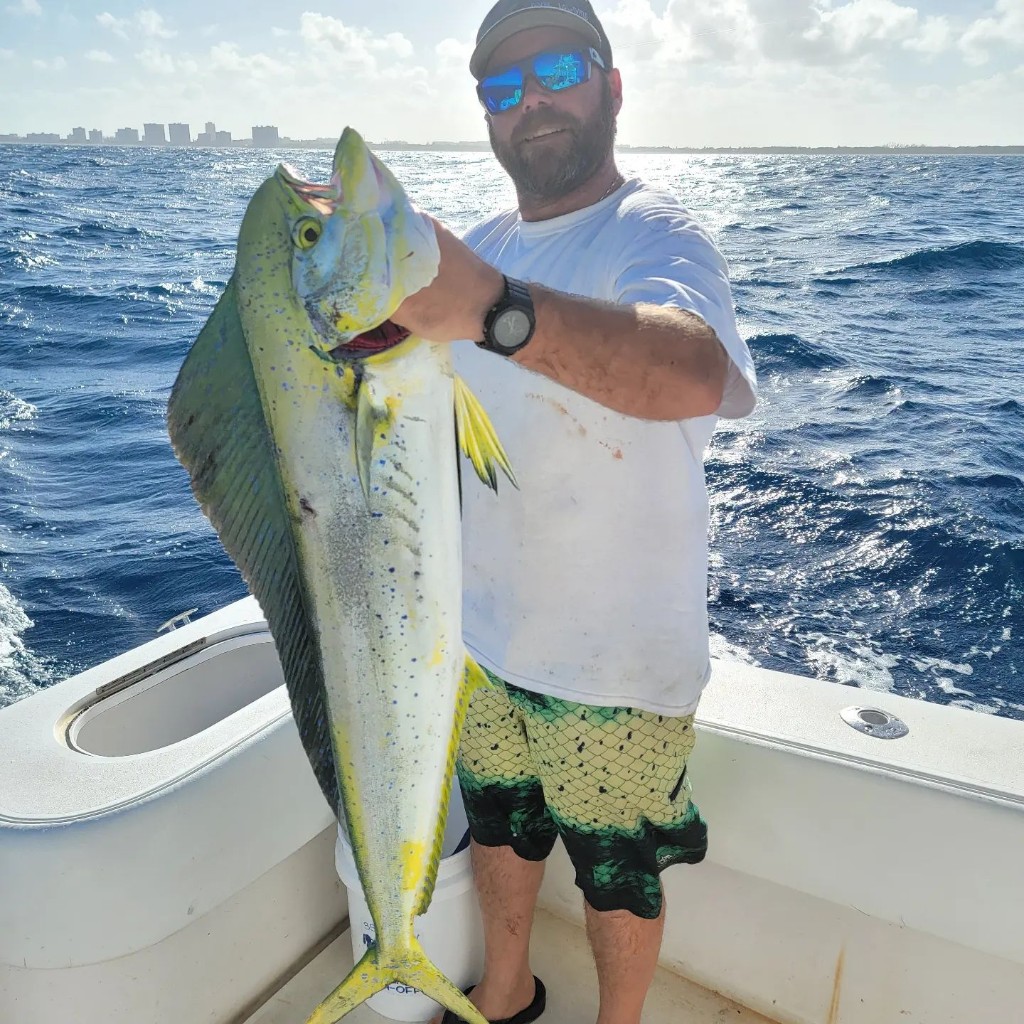 A single angler fishing at Pompano Beach