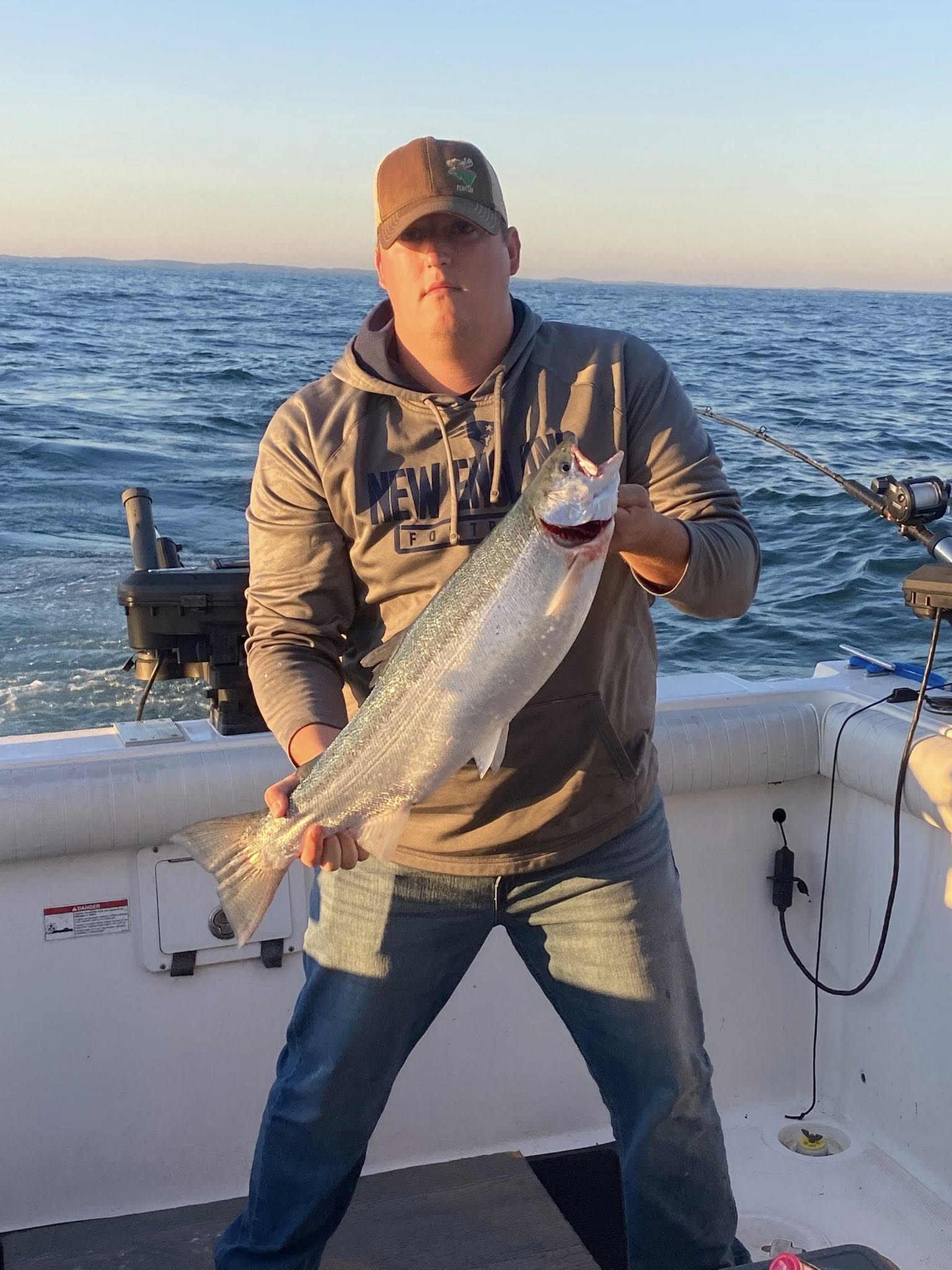 One angler enjoying a fishing trip in Oswego