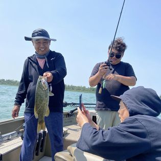 Two anglers fishing on shore in Ontario