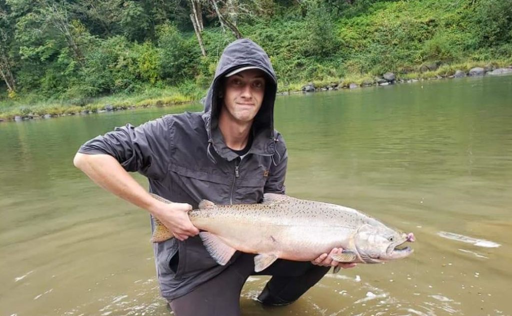 Photograph of a large pink salmon being caught while fishing in OR