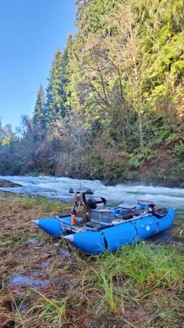 Fisherman with fishing rod enjoying outdoor adventure in Hebo