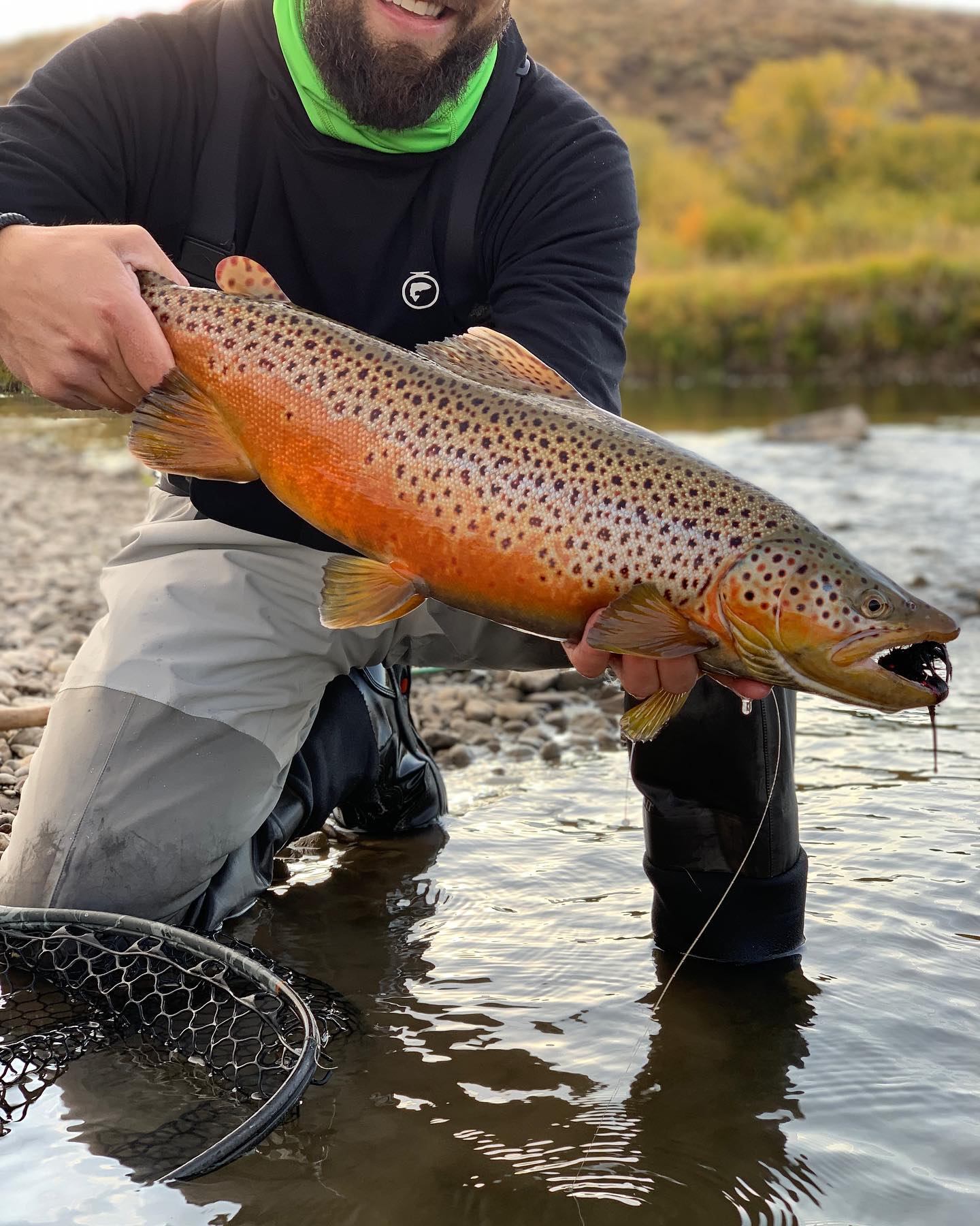 Photograph of a sea trout fish caught by a person in UT